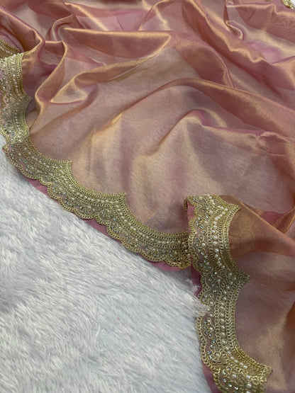 Mauve tissue saree border with detailed gold embroidery and scalloped trim